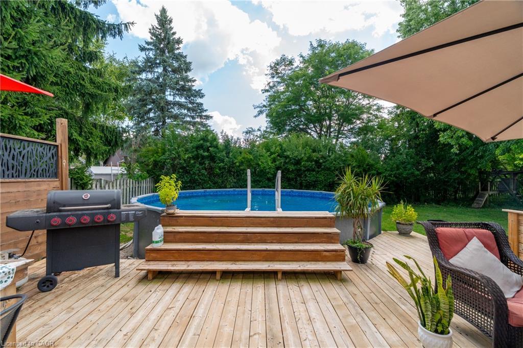 21 Burwell Road, Stratford, ON - Outdoor With Above Ground Pool With Deck Patio Veranda
