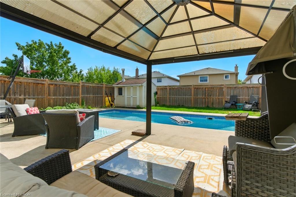 580 Deerhurst Drive, Burlington, ON - Outdoor With In Ground Pool With Deck Patio Veranda With Backyard