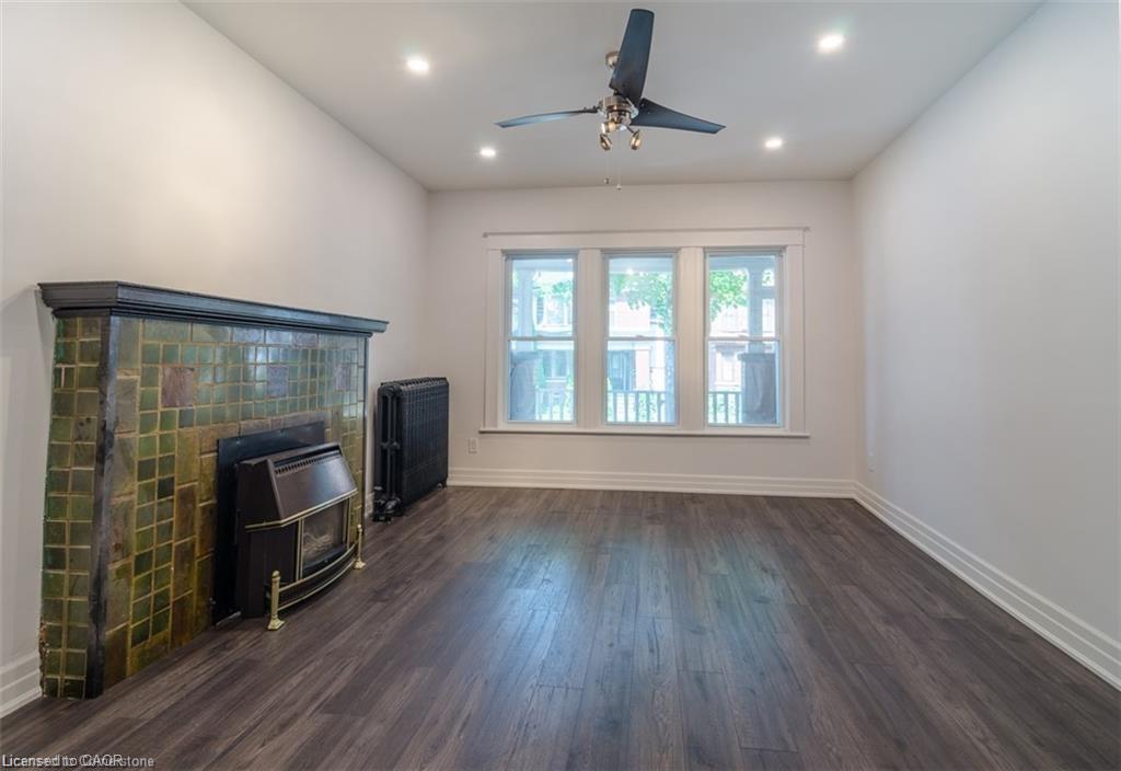 115 Spadina Avenue, Hamilton, ON - Indoor Photo Showing Other Room With Fireplace