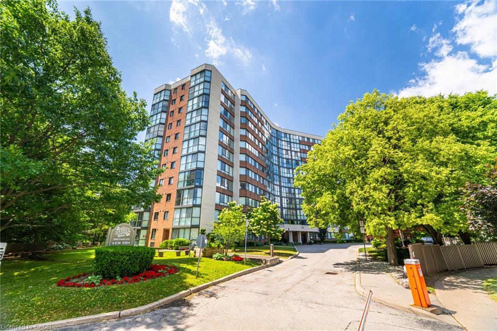 606-1240 Marlborough Court, Oakville, ON - Outdoor With Facade