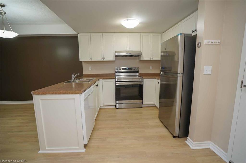 106-39 Goodwin Drive, Guelph, ON - Indoor Photo Showing Kitchen With Double Sink