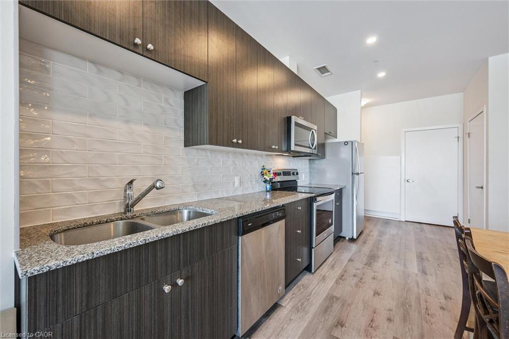 902-100 Garment Street, Kitchener, ON - Indoor Photo Showing Kitchen With Double Sink With Upgraded Kitchen