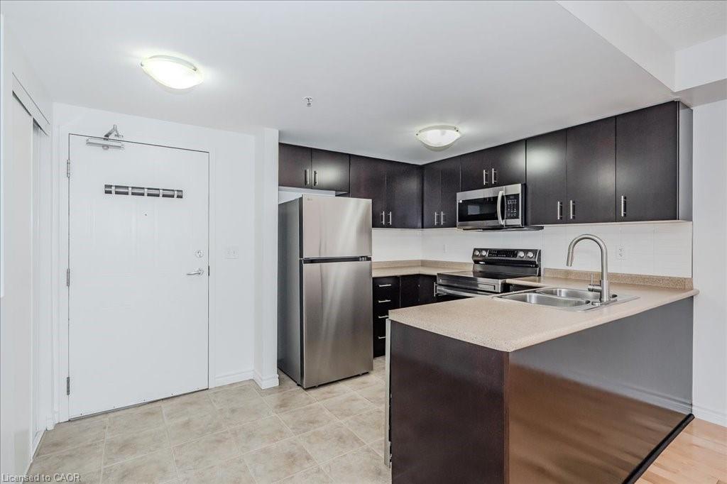 202-41 Goodwin Drive, Guelph, ON - Indoor Photo Showing Kitchen With Double Sink