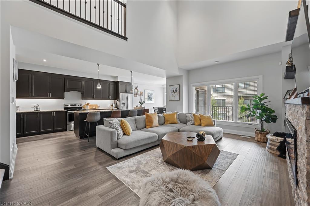 21-271 Grey Silo Road, Waterloo, ON - Indoor Photo Showing Living Room With Fireplace