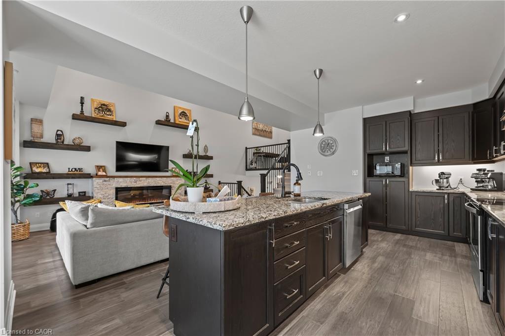 21-271 Grey Silo Road, Waterloo, ON - Indoor Photo Showing Other Room With Fireplace
