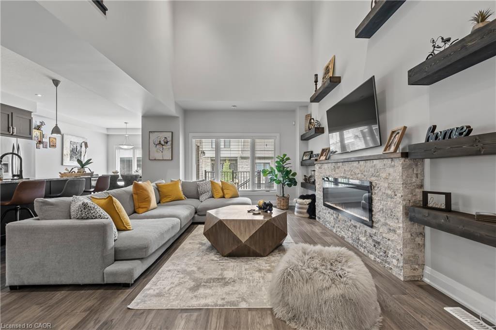 21-271 Grey Silo Road, Waterloo, ON - Indoor Photo Showing Living Room With Fireplace
