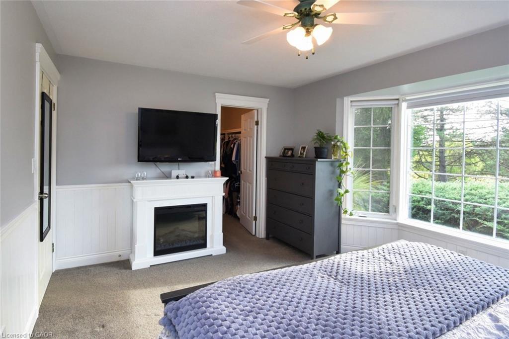 1284 Highway 54 Highway, Haldimand, ON - Indoor Photo Showing Bedroom With Fireplace