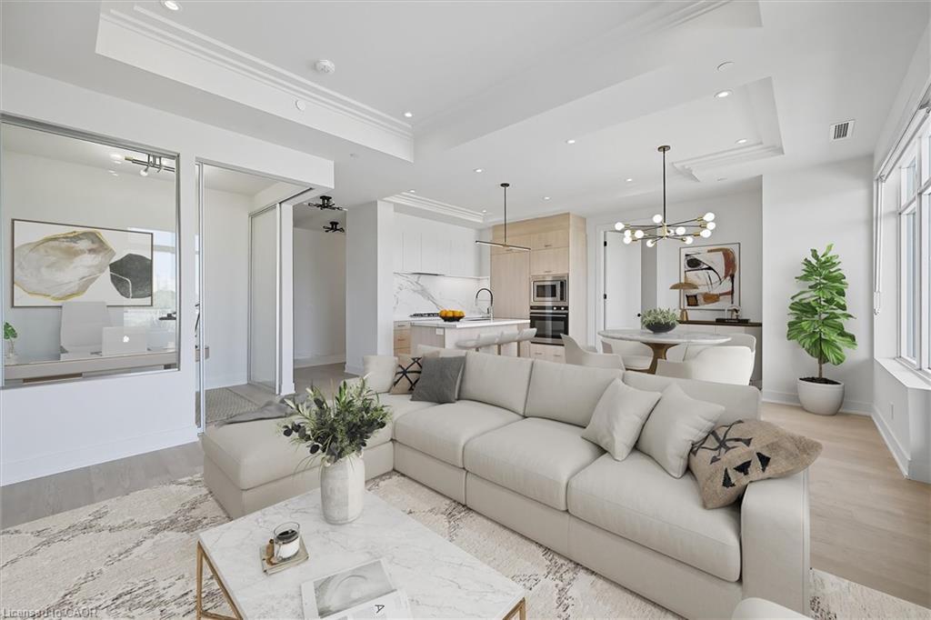 409-123 Maurice Drive, Oakville, ON - Indoor Photo Showing Living Room