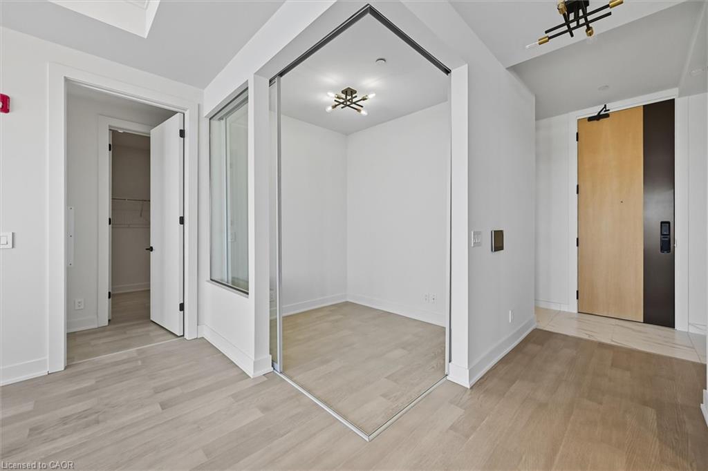 409-123 Maurice Drive, Oakville, ON - Indoor Photo Showing Other Room