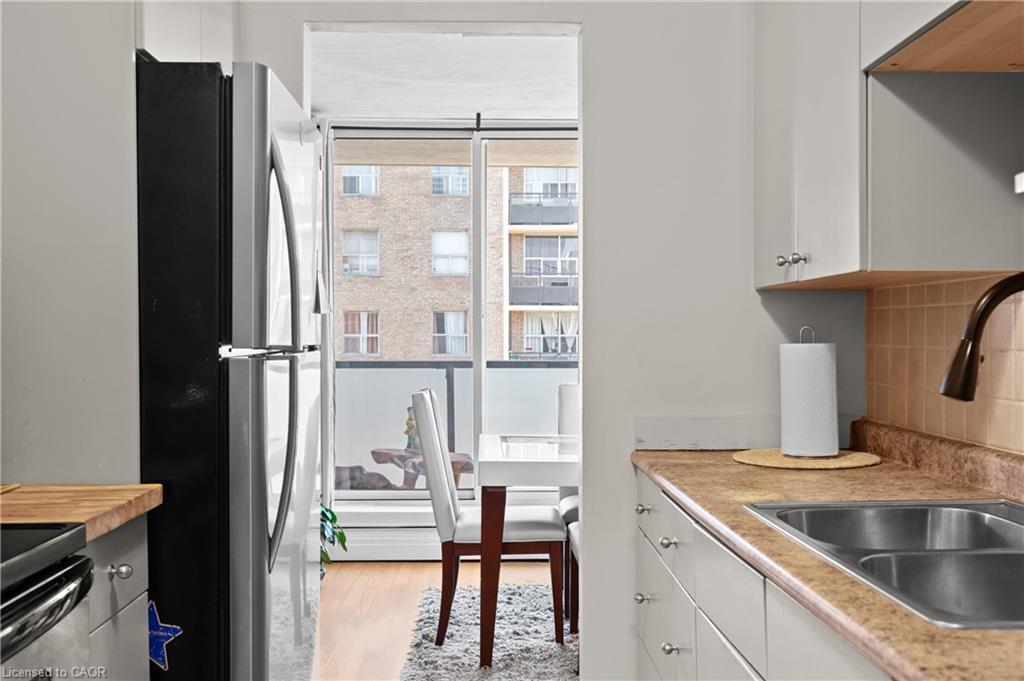 801-359 Geneva Street, St. Catharines, ON - Indoor Photo Showing Kitchen With Double Sink