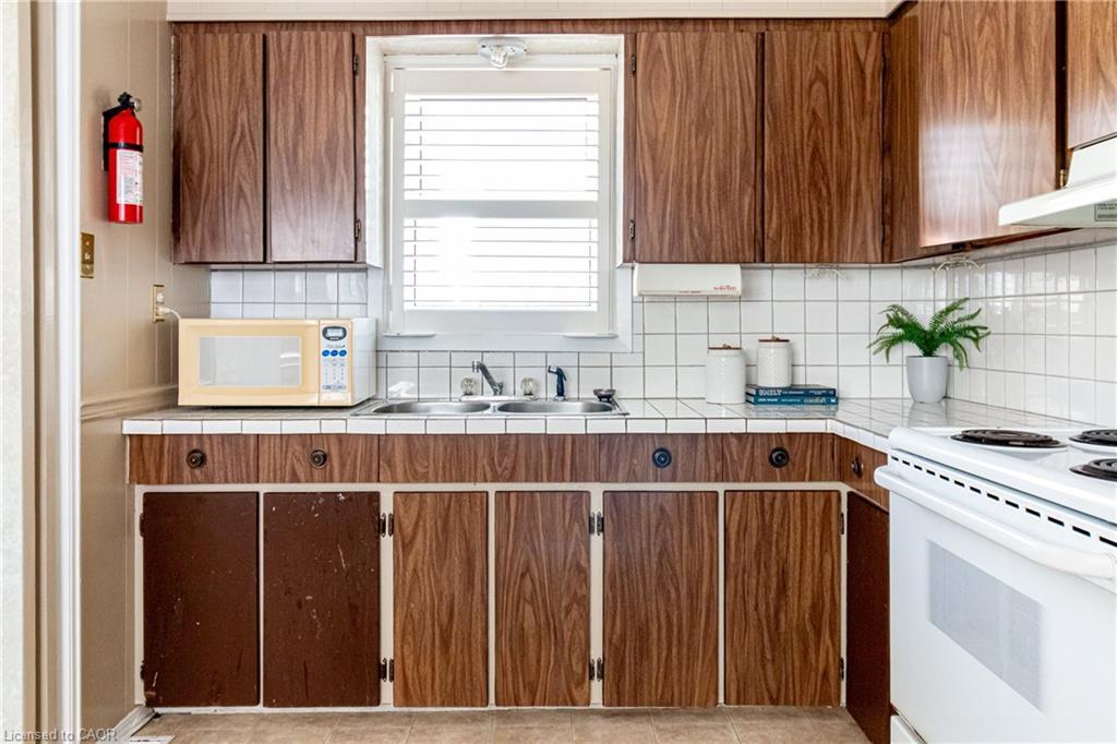 70 Poulette Street, Hamilton, ON - Indoor Photo Showing Kitchen With Double Sink