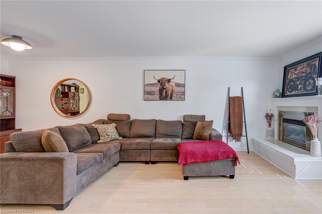 5-1560 Kerns Road, Burlington, ON - Indoor Photo Showing Living Room With Fireplace