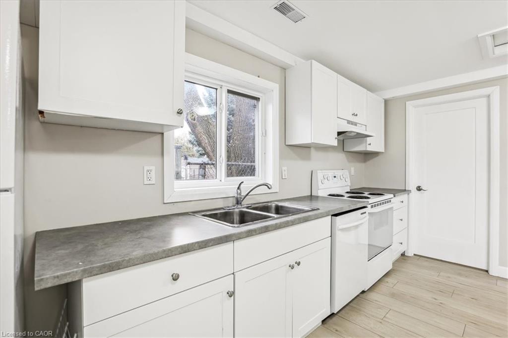 19 Bailey Street, St. Catharines, ON - Indoor Photo Showing Kitchen With Double Sink