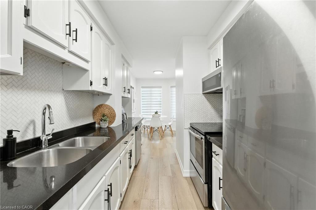 4-2252 Walkers Line, Burlington, ON - Indoor Photo Showing Kitchen With Double Sink