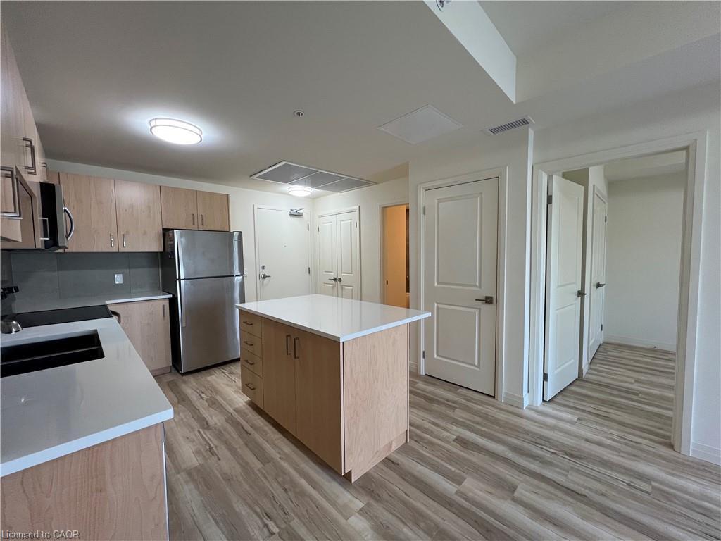 412-301 Westmount Road W, Kitchener, ON - Indoor Photo Showing Kitchen With Stainless Steel Kitchen With Double Sink