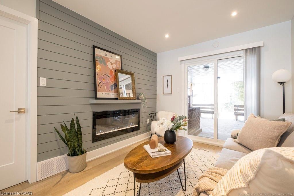A-225 East 24Th Street, Hamilton, ON - Indoor Photo Showing Living Room With Fireplace