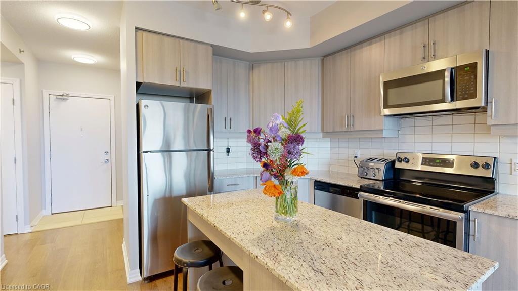 304-560 North Service Road, Grimsby, ON - Indoor Photo Showing Kitchen With Stainless Steel Kitchen
