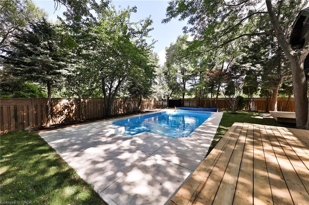 2309 Dunedin Road, Oakville, ON - Outdoor With In Ground Pool With Deck Patio Veranda With Backyard
