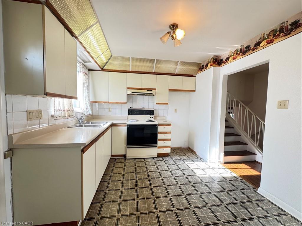 176 Laurier Avenue, Hamilton, ON - Indoor Photo Showing Kitchen With Double Sink