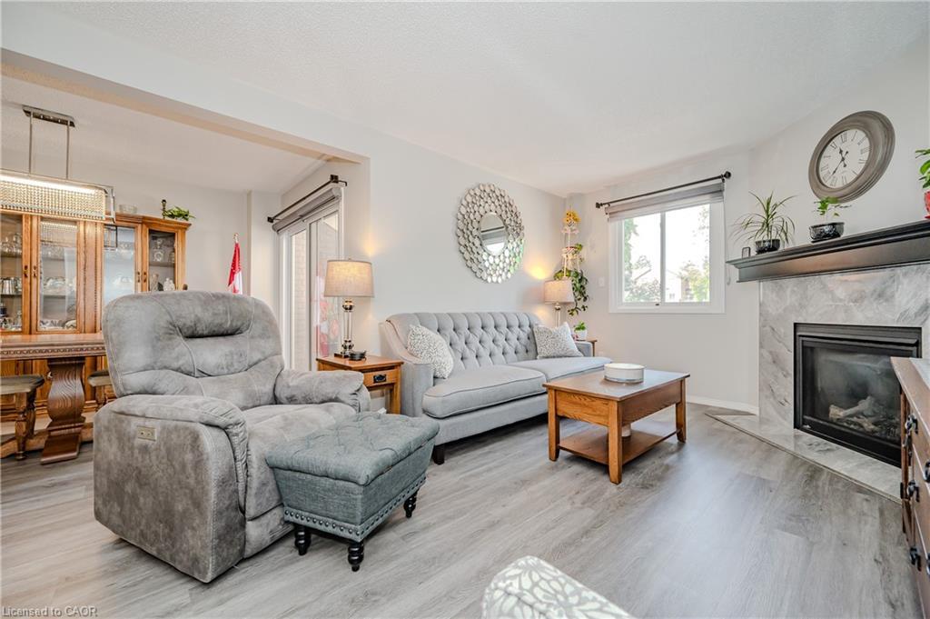 21-38 Elora Drive, Hamilton, ON - Indoor Photo Showing Living Room With Fireplace