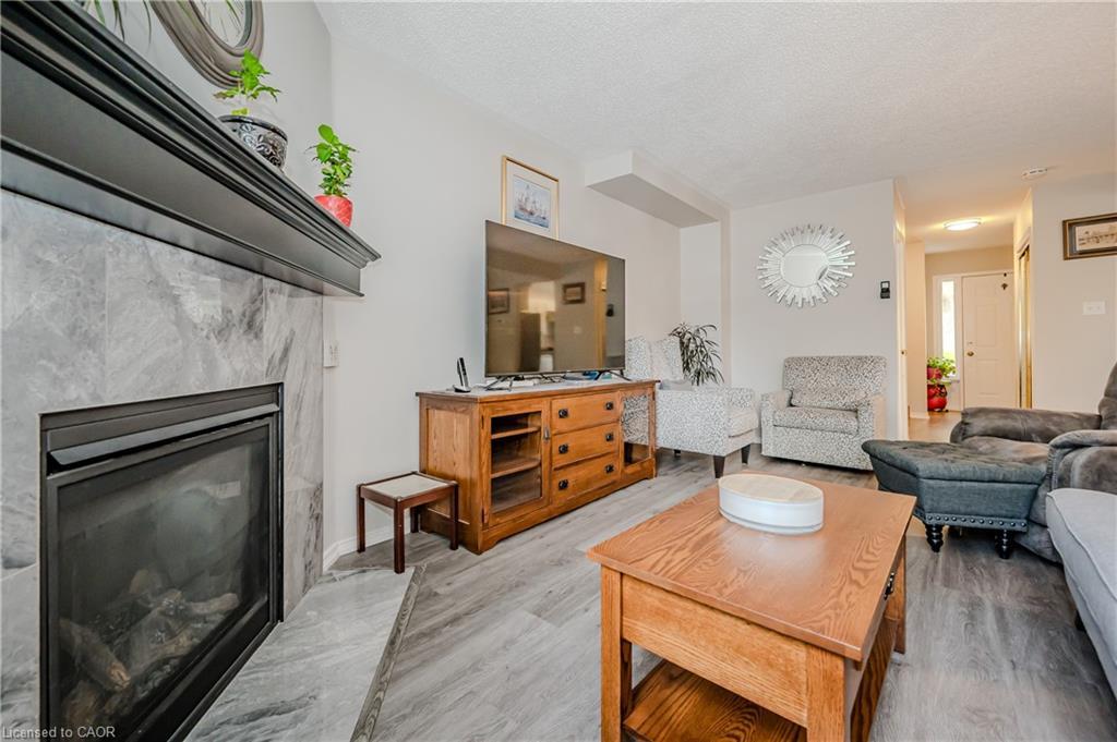 21-38 Elora Drive, Hamilton, ON - Indoor Photo Showing Living Room With Fireplace
