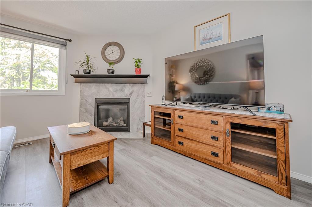 21-38 Elora Drive, Hamilton, ON - Indoor Photo Showing Living Room With Fireplace