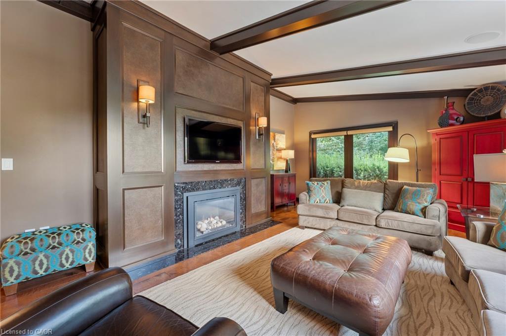 25 Sunset Drive, Simcoe, ON - Indoor Photo Showing Living Room With Fireplace