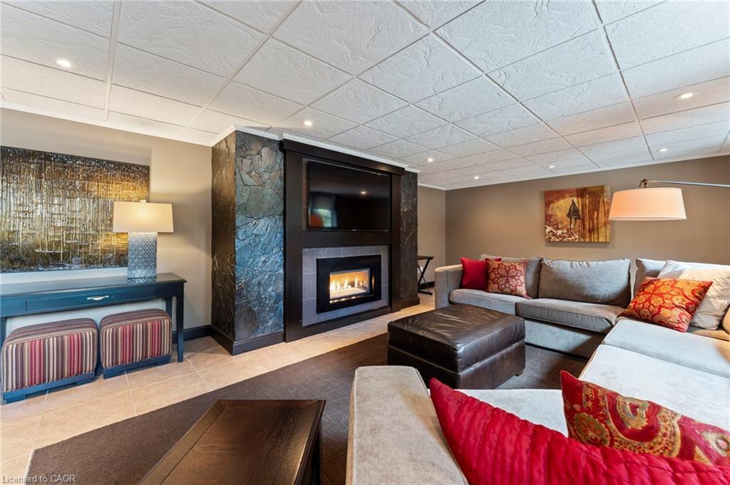 25 Sunset Drive, Simcoe, ON - Indoor Photo Showing Living Room With Fireplace