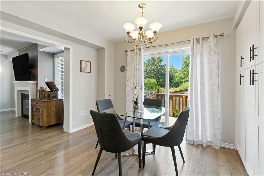 8769 Dogwood Crescent, Niagara Falls, ON - Indoor Photo Showing Dining Room With Fireplace