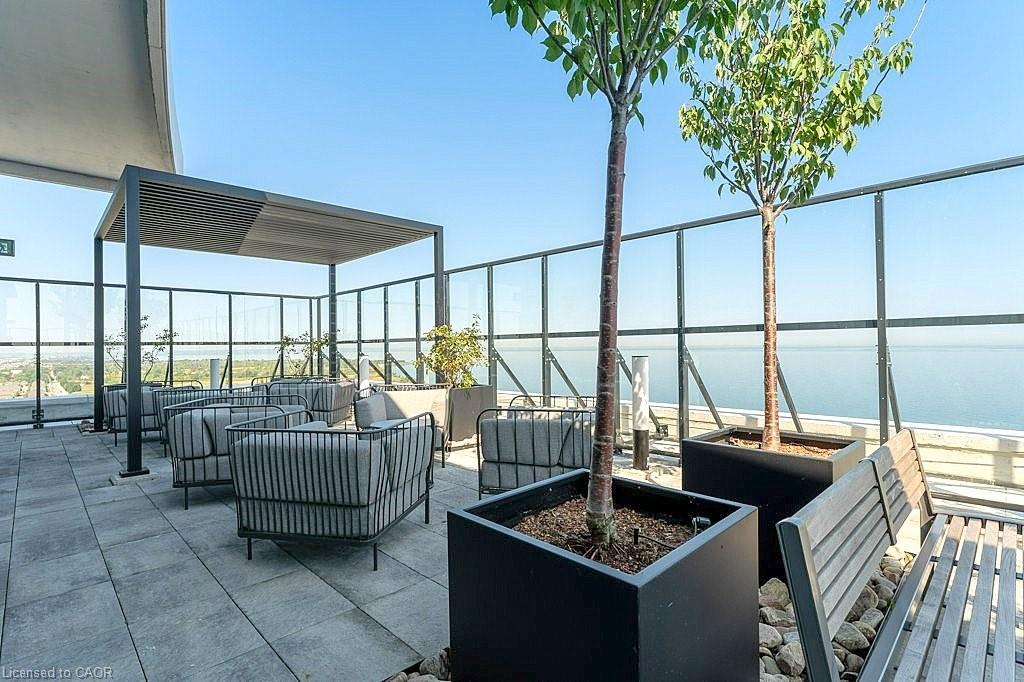 1402-385 Winston Road, Grimsby, ON - Outdoor With Body Of Water With Deck Patio Veranda With Exterior