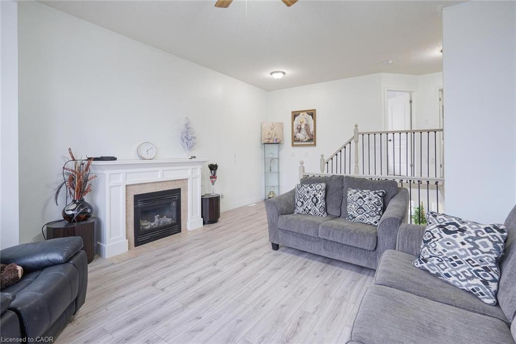 1860 Devos Drive, London, ON - Indoor Photo Showing Living Room With Fireplace