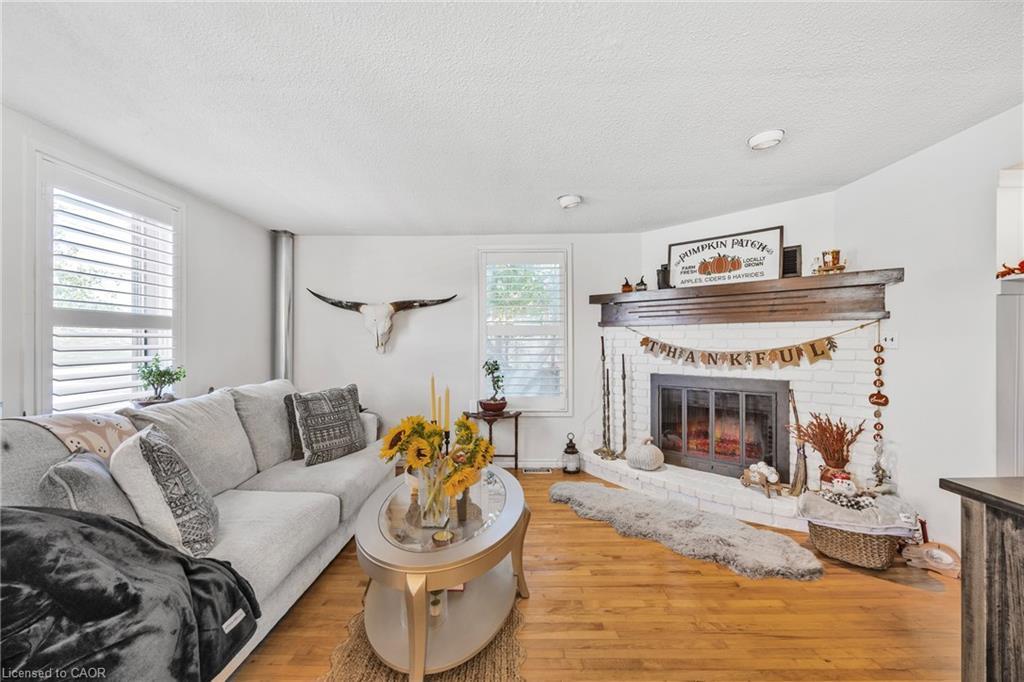 83 Orkney Street W, Caledonia, ON - Indoor Photo Showing Living Room With Fireplace