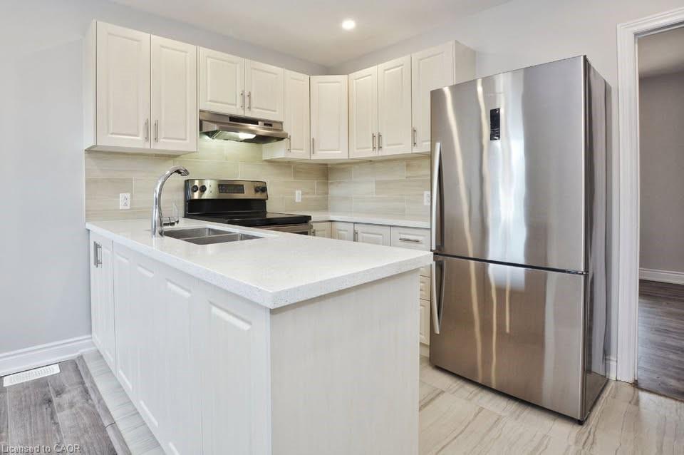 Main-21 Fife Street, Hamilton, ON - Indoor Photo Showing Kitchen With Stainless Steel Kitchen With Double Sink