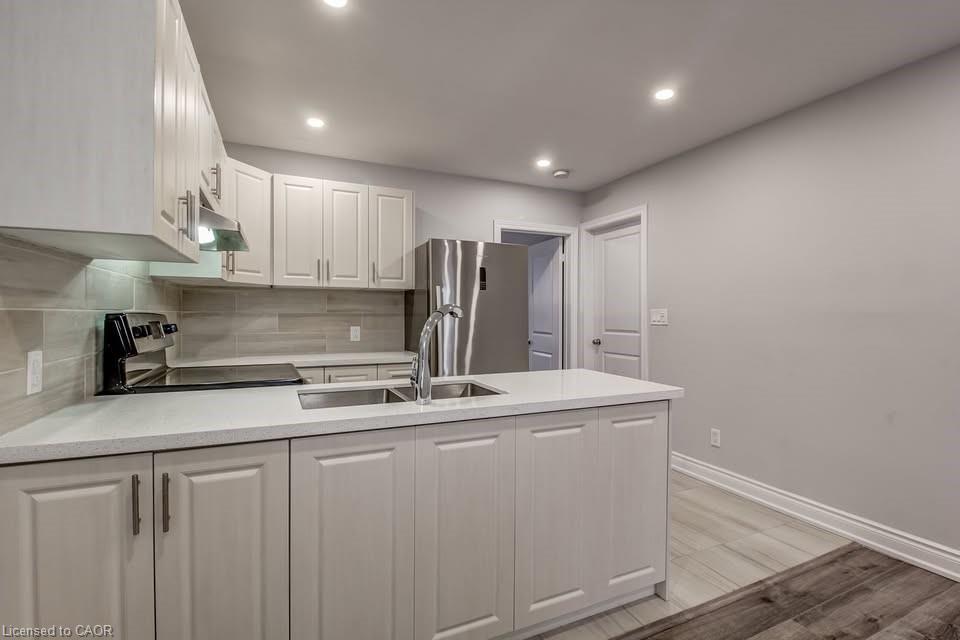 Main-21 Fife Street, Hamilton, ON - Indoor Photo Showing Kitchen With Double Sink