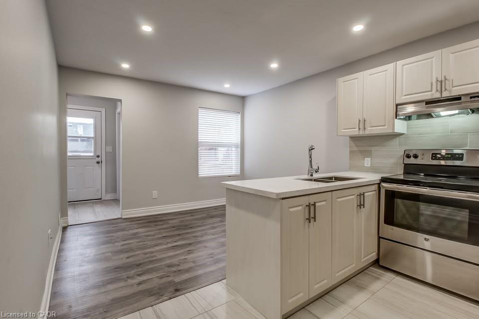 Main-21 Fife Street, Hamilton, ON - Indoor Photo Showing Kitchen With Double Sink