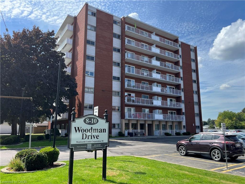 308-10 Woodman Drive S, Hamilton, ON - Outdoor With Balcony With Facade