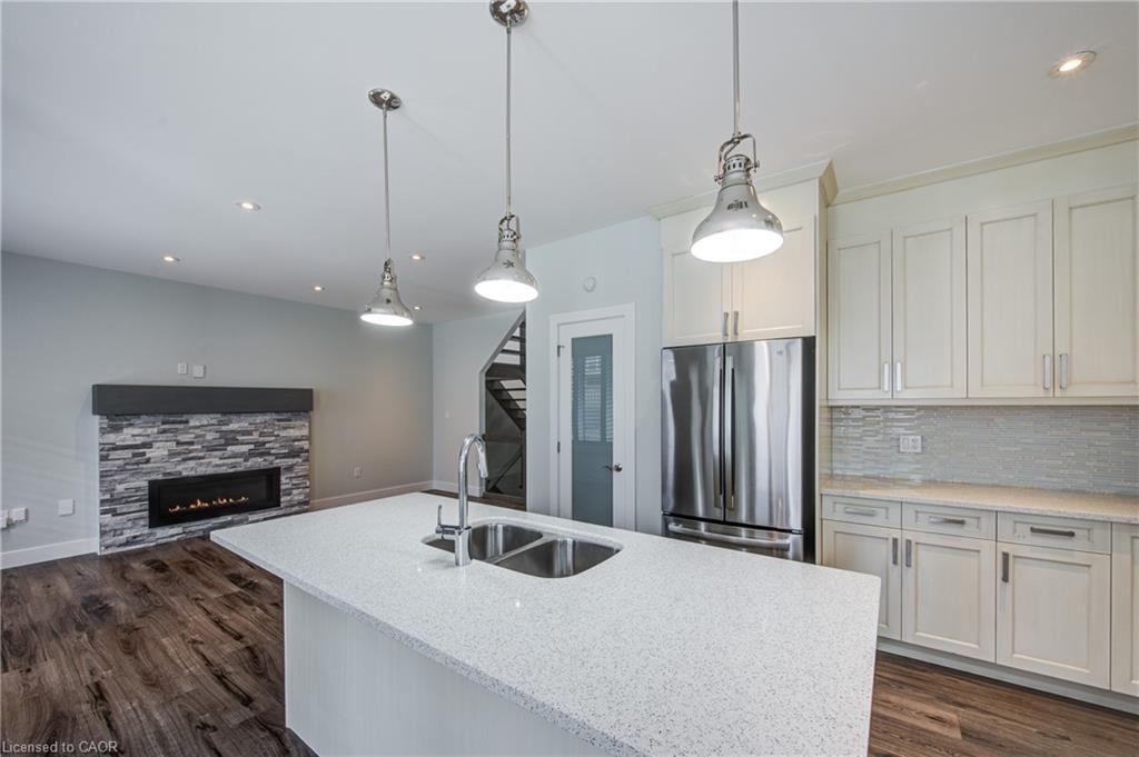 2527 Holbrook Drive, London, ON - Indoor Photo Showing Kitchen With Fireplace With Double Sink With Upgraded Kitchen