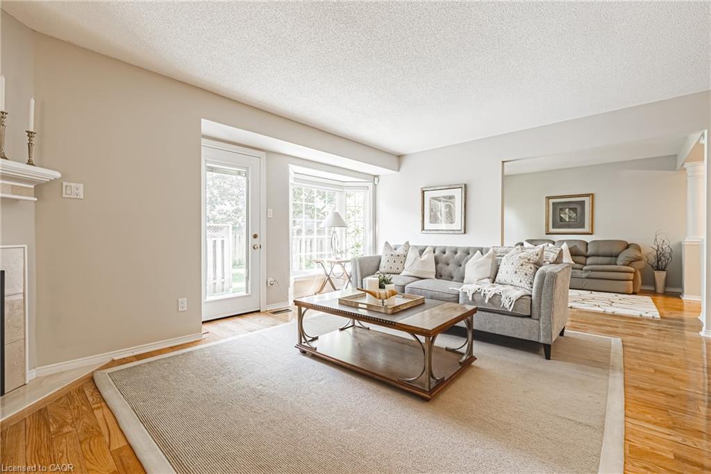 9-3333 New Street, Burlington, ON - Indoor Photo Showing Living Room With Fireplace
