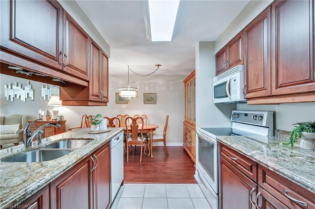 205-970 Golf Links Road, Ancaster, ON - Indoor Photo Showing Kitchen With Double Sink