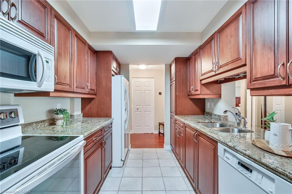 205-970 Golf Links Road, Ancaster, ON - Indoor Photo Showing Kitchen With Double Sink