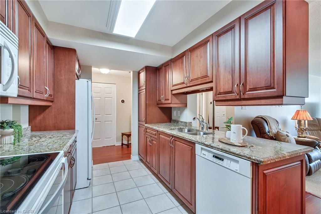 205-970 Golf Links Road, Ancaster, ON - Indoor Photo Showing Kitchen With Double Sink