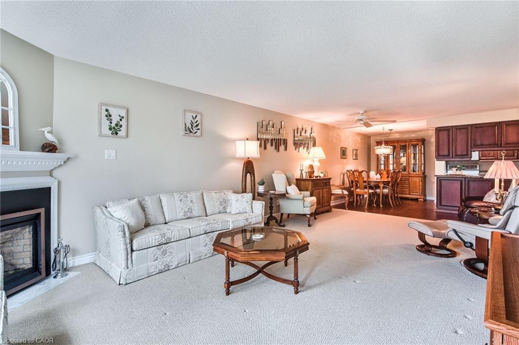 205-970 Golf Links Road, Ancaster, ON - Indoor Photo Showing Living Room With Fireplace