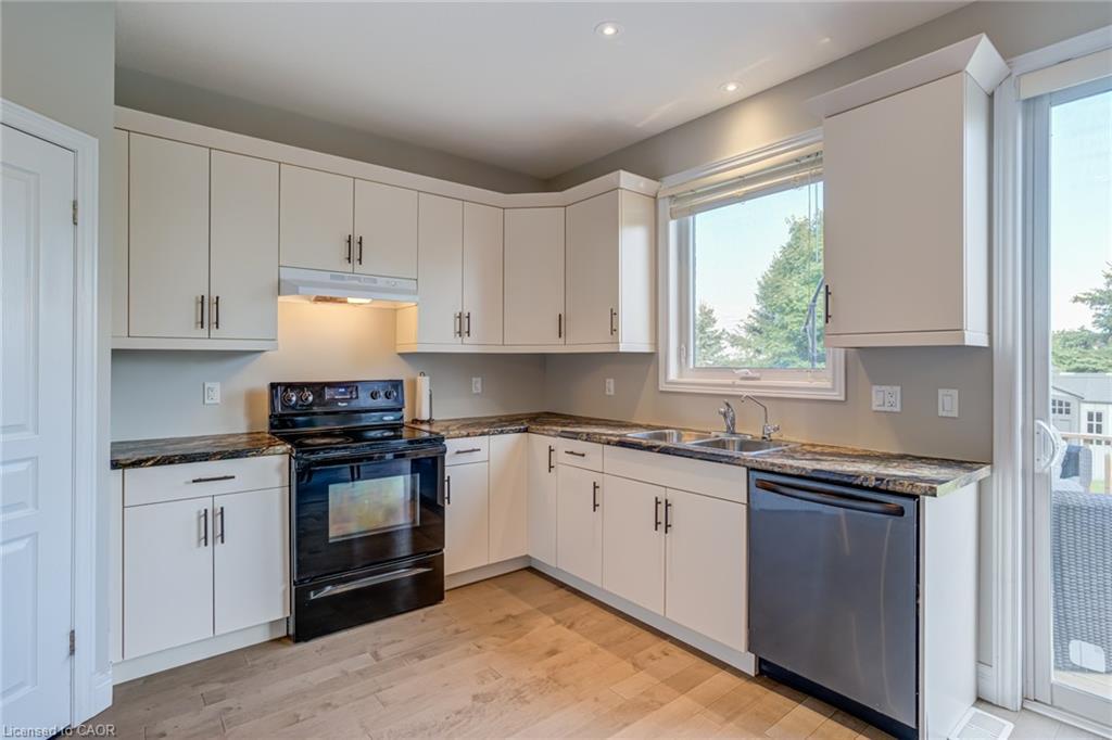91 Taylor Drive, Grand Valley, ON - Indoor Photo Showing Kitchen With Double Sink