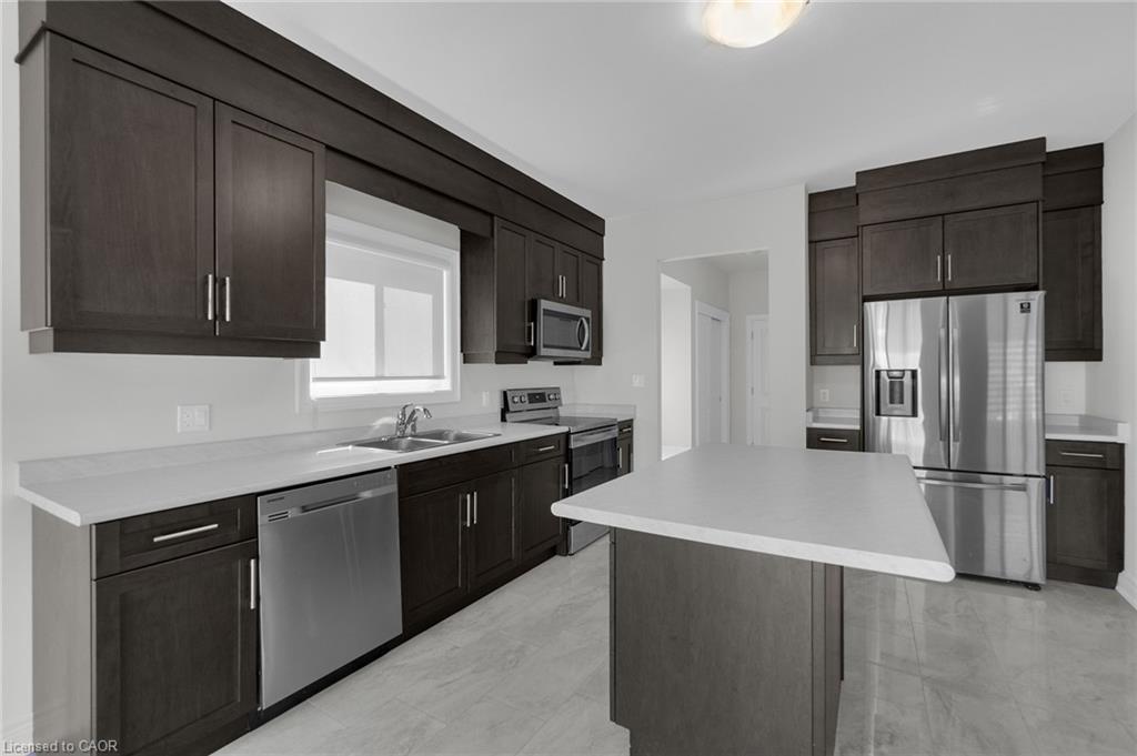 27 Monarch Street, Welland, ON - Indoor Photo Showing Kitchen With Double Sink