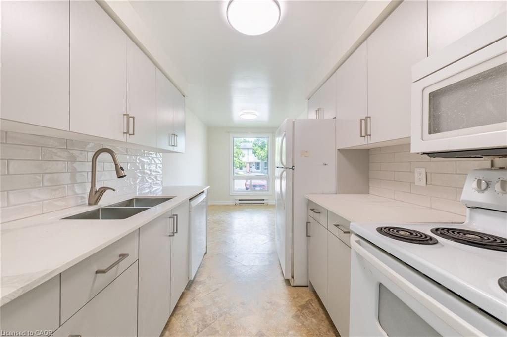 55-40 Imperial Road N, Guelph, ON - Indoor Photo Showing Kitchen With Double Sink
