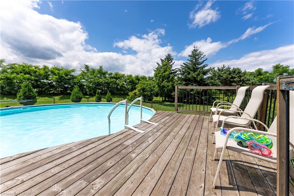 5400 North Service Road, Beamsville, ON - Outdoor With Above Ground Pool With Deck Patio Veranda