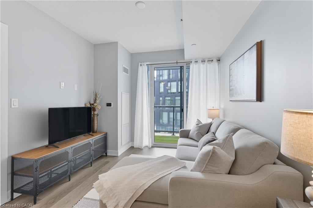 B602-3200 Dakota Common, Burlington, ON - Indoor Photo Showing Living Room