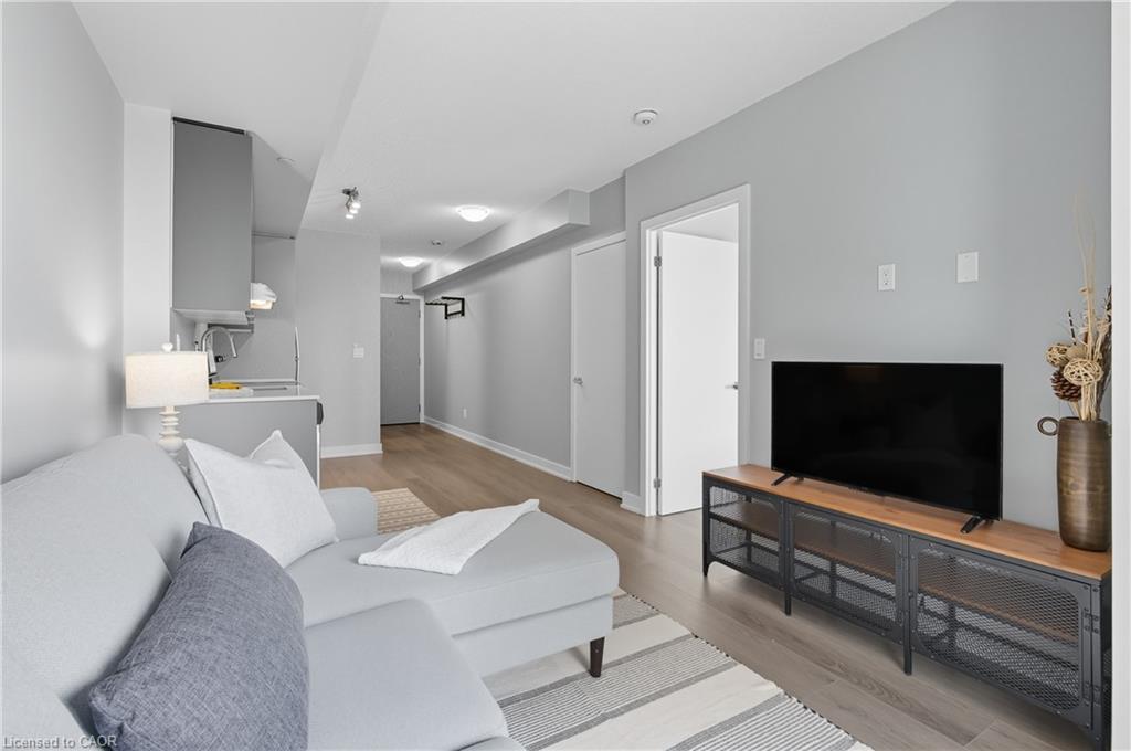 B602-3200 Dakota Common, Burlington, ON - Indoor Photo Showing Living Room