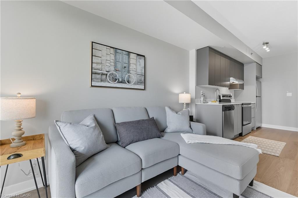 B602-3200 Dakota Common, Burlington, ON - Indoor Photo Showing Living Room