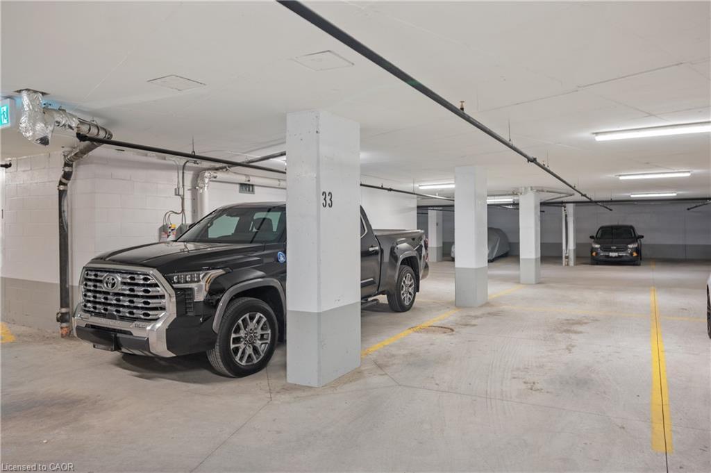 B602-3200 Dakota Common, Burlington, ON - Indoor Photo Showing Garage